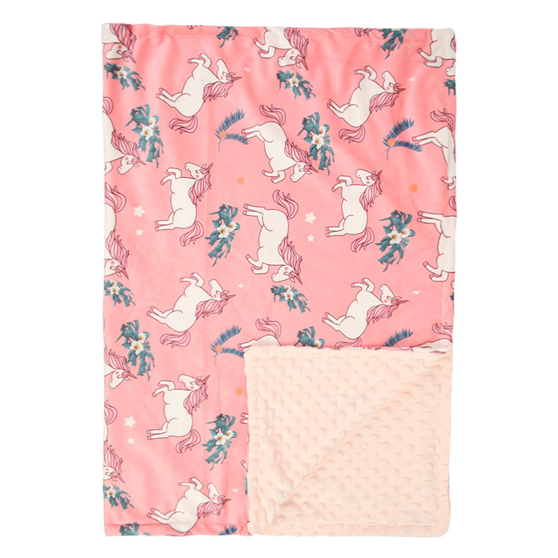 Couverture bébé motifs imprimés rose licorne