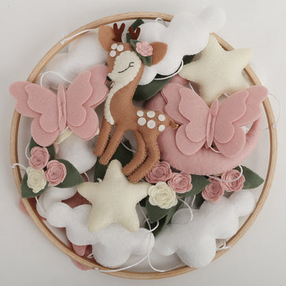 mobile bébé pour lit biche plat