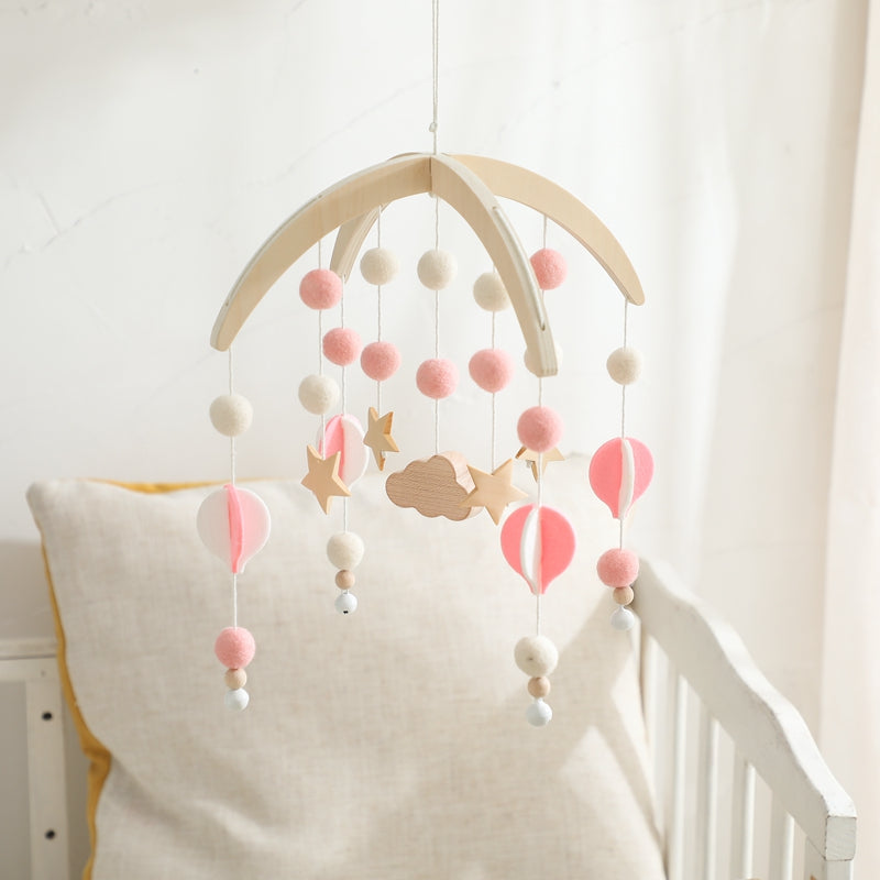 mobile mongolfière rose coussin