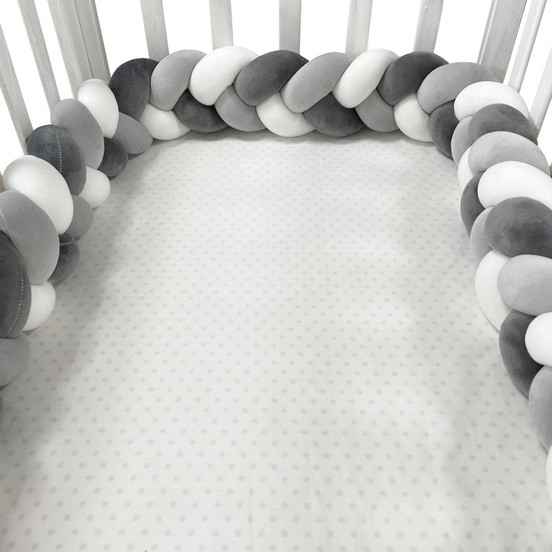 tresse-de-lit-bébé-gris-foncé-blanc-diagonale