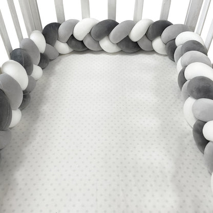 tresse-de-lit-bébé-gris-foncé-blanc-diagonale